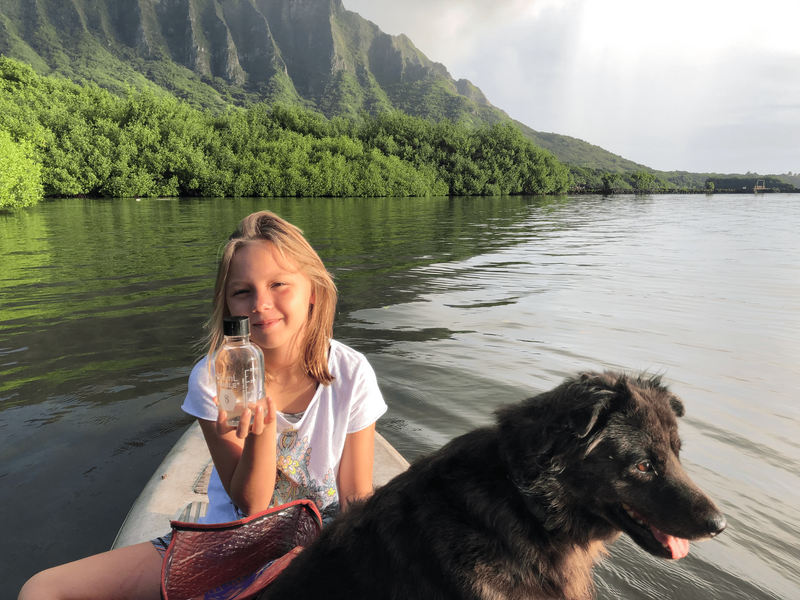 blue water task force volunteer with sample at hakipuʻu boat ramp