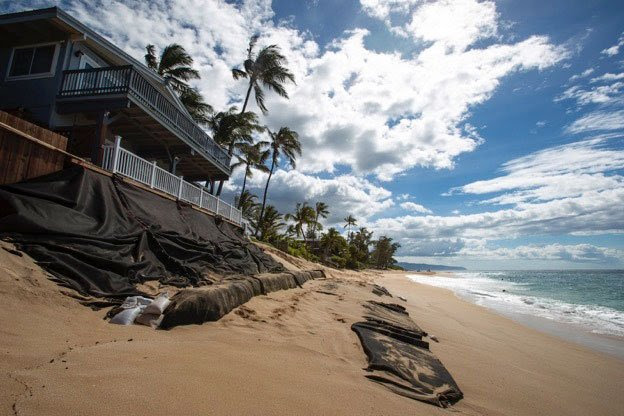 NS erosion and sandbags along houses